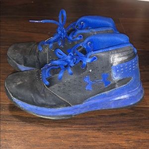 Blue and black Under Armour shoes